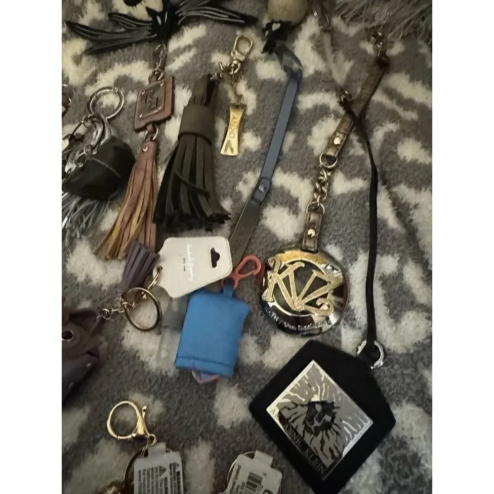 Lot of designer keychains,bag charms bling disney tassell
